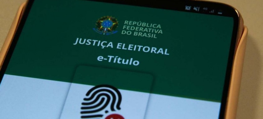 O Tribunal Superior Eleitoral (TSE) recomenda que a justificativa seja feita preferencialmente por meio do aplicativo e-Título - Foto: Divulgação Agência Brasil O Tribunal Superior Eleitoral (TSE) recomenda que a justificativa seja feita preferencialmente por meio do aplicativo e-Título