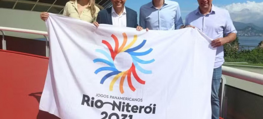 Isabel Swan, Rodrigo Neves, Eduardo Cavaliere e Guilherme Schleder apresentam o logo da candidatura do Pan 2031
- Foto: Divulgação Isabel Swan, Rodrigo Neves, Eduardo Cavaliere e Guilherme Schleder apresentam o logo da candidatura do Pan 2031